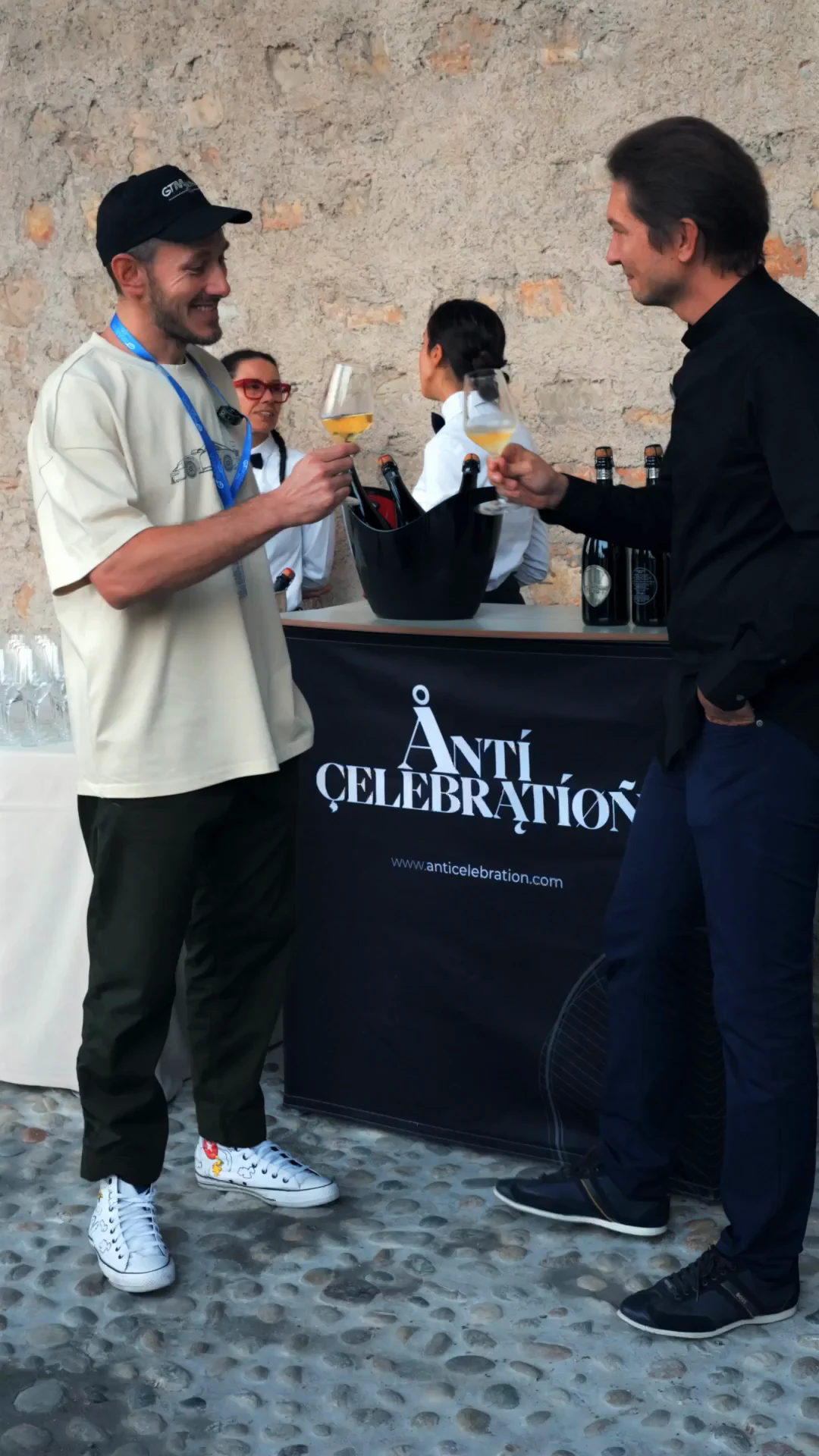 A toast at the Anticelebration stand